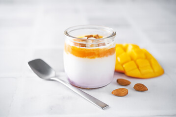 Greek yogurt mango healthy breakfast in a jar