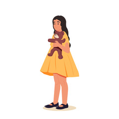 Cute baby hugging a soft toy, Teddy. Happy smiling girl hugging a teddy bear. A joyful kindergarten kid.