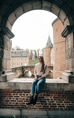 Fototapeta na wymiar Girl at the castle in Alden Biesen, Limburg, Belgium