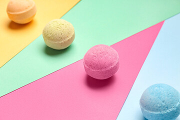 Bath bombs on color background, closeup