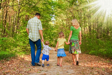 Fototapeta premium happy young family in nature