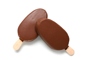 Delicious chocolate covered ice cream on stick against white background