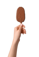 Woman holding delicious chocolate covered ice cream on stick against white background