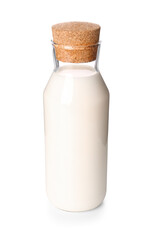 Glass bottle of milk on white background