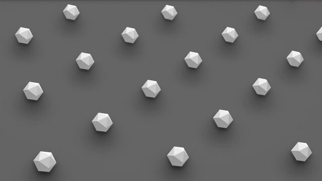 Abstract 3d render of platonic isoca shapes with random rotating effect in isometric view. Computer generated loop animation. 4K seamless motion design