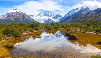 Cerro Torre, Famous Muntain Peak in Chalten Range, Los Glaciares National Park Patagonia Argentina. Scenic Landscape Reflection in Calm Lake on a Hiking Trail to Laguna Torre