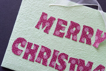 merry christmas (sign with some letters running beyond the frame)