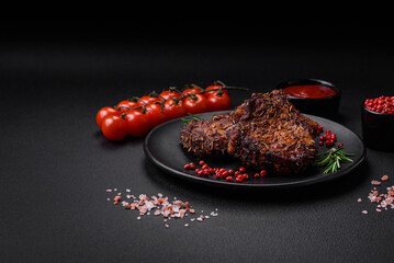 Delicious beef or pork steak on the bone grilled with spices and rosemary