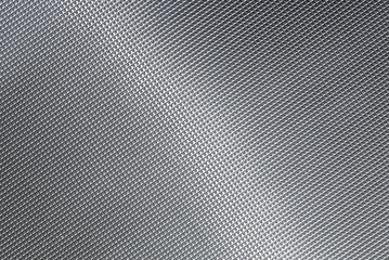 The texture of the metal stamped panel, background.