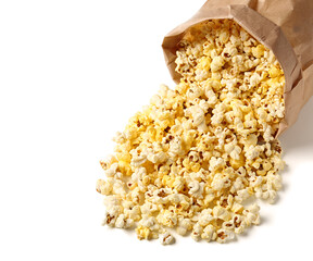 Paper bag with crispy popcorn on white background