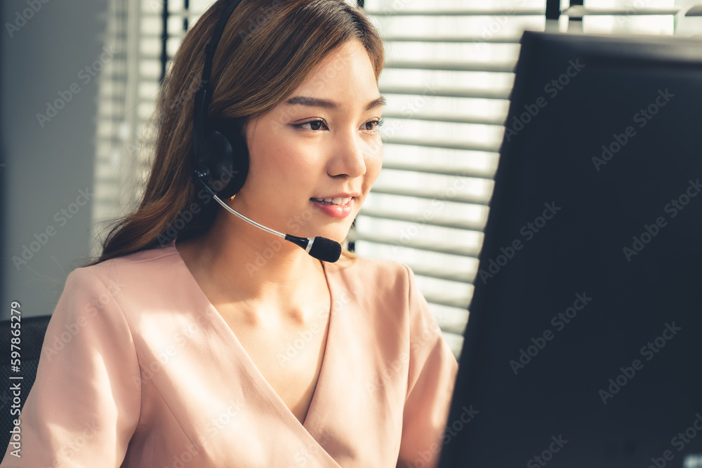 Aufkleber competent female operator working on computer and while talking with clients. concept relevant to bo