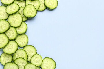 Slices of cucumber on blue background