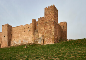 Fototapeta na wymiar exterior view of the Castle of Sigüenza with its round Arab towers and the square Christian towers