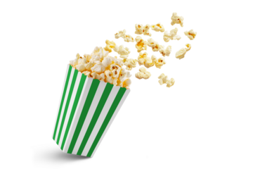 Popcorn flying out of green white striped paper box isolated on white, transparent background, PNG, with copy space. Splash, levitation of popcorn grains.