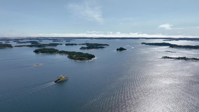Vehicle ferry and boats in archipelago sea in Finland