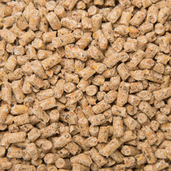 Natural Wooden Cat Litter Top View. Compacted Wooden Sawdust Pellets - Natural Cat Litter Filler or Organic Fuel. Biofuel, Biofuels, Eco Fuels