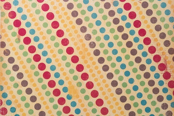 retro scrapbook paper background featuring many circles or dots on a neutral background