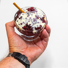 Red wine sago with vanilla cream, traditional cultural dessert from southern Brazil. gaucho culture