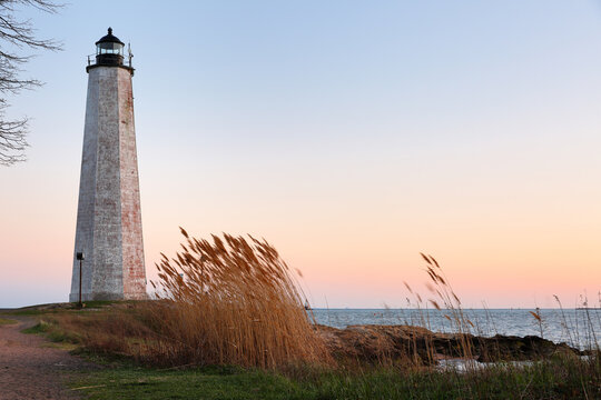 Beautiful sunset of New Haven Light House, Connecticut, USA. The lighthouse is dark, but the tower remains, greeting ships from around the world to New Haven. 