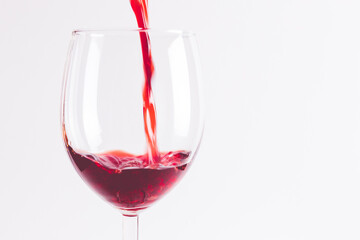 Filling a Glass with Red Wine