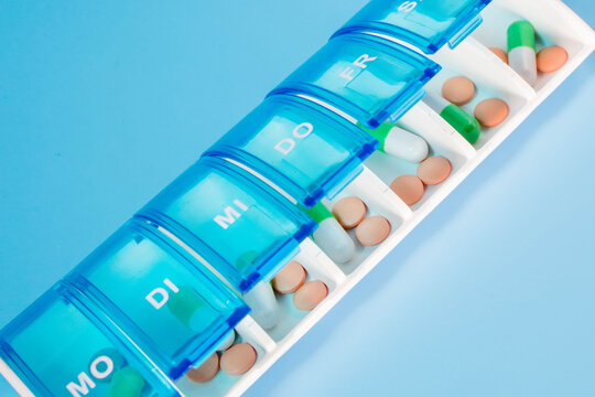 Plastic container for storing pills. Organization of storage of tablets for each day