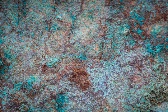 Detail of copper ore embedded in granite rock
