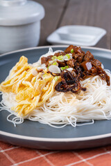 a plate of vegetarian birthday noodle