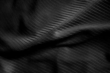 Dark black and gray blurred gradient and line of cloth or fablic background has a little abstract...