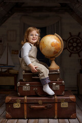 Children play in the attic of their house. Imagine themselves as tourists, explorers. Look through...