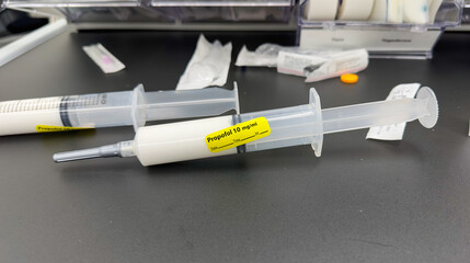 Hospital syringe drugs like anesthesia, propofol, and fentanyl have both positive and negative symbolic meanings. propofol and fentanyl have been associated with high rates of addiction, overdose