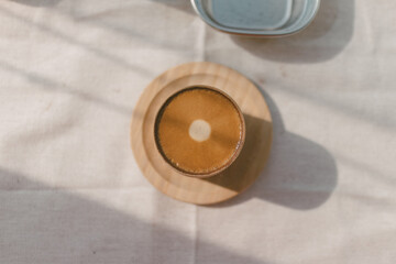 Close up of pressed espresso coffee on the table by the window.