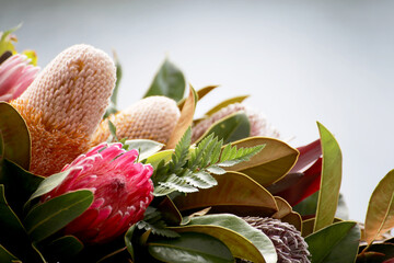 Australian native flowers for funeral with include Banksias, protea and leucodendron isolated bereavement