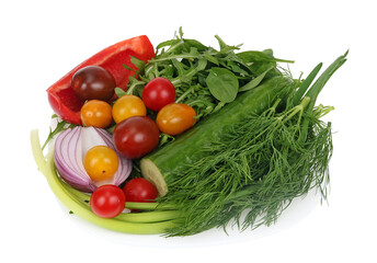 Fresh vegetables for salad - cucumber, tomato, onion and herbs isolated