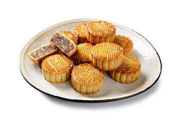Traditional Chinese  dessert. Homemade baked mooncakes filled with nuts and dried fruits, Chinese Mid-Autumn Festival food. isolated on white background