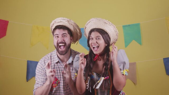 Brazilian couple, dressed in Junina party clothes, S&atilde;o Jo&atilde;o party. Protocol scenes.