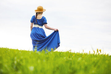 Girl in the countryside in the evening