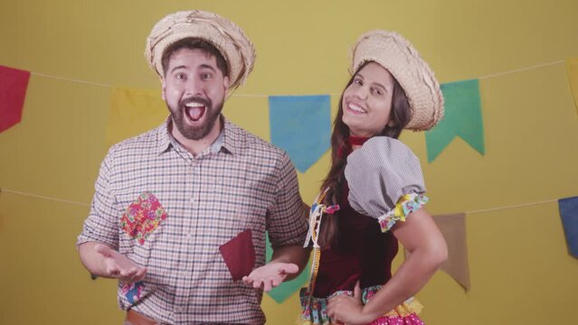 Brazilian couple, dressed in Junina party clothes, S&atilde;o Jo&atilde;o party. Protocol scenes.