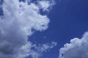 White, fluffy clouds in blue sky. Background from clouds.
White, fluffy clouds in blue sky. Background from clouds.
