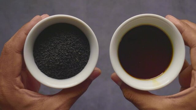 Black Cumin seed and oil in a container 