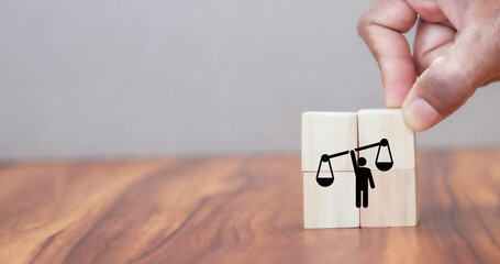 Business ethics concept. Business moral principles concept. Hand holds the wooden cubes with 