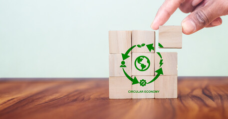 Circular economy concept, recycle, environment, reuse, manufacturing, waste, consumer, resources. LCA Life cycle assessment. Sustainability Wooden cubes; symbol of circular economy.