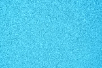 Blue cement wall texture for background and copy space for text. Blue paper background.