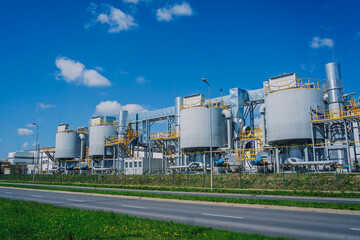A modern factory building by the highway road 