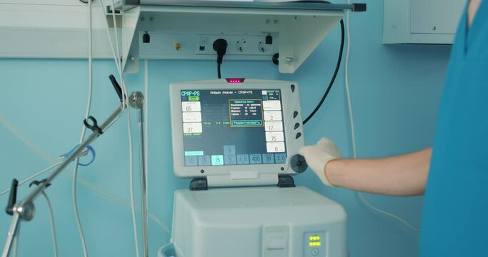 doctor trying to save sick pale old man's life with modern medicine. Pneumonia diagnosting. COVID-19 and coronavirus identification. Pandemic. nurse opening the eyes of patient, checking his condition
