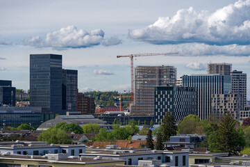 Scenic view of skyline of Zürich North on a blue cloudy spring afternoon. Photo taken April 29th,...