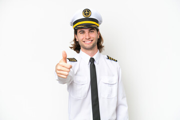 handsome Airplane pilot isolated on white background with thumbs up because something good has happened