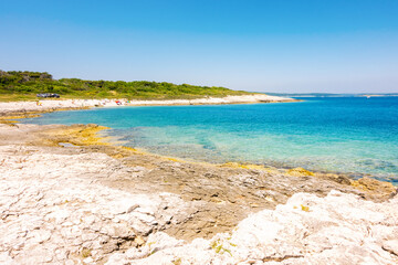 Wild tropical blue lagoon beach on a sunny day. Kvarner Bay, Croatia, Europe.