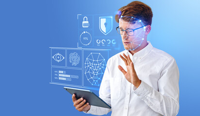 Man with tablet, facial recognition interface