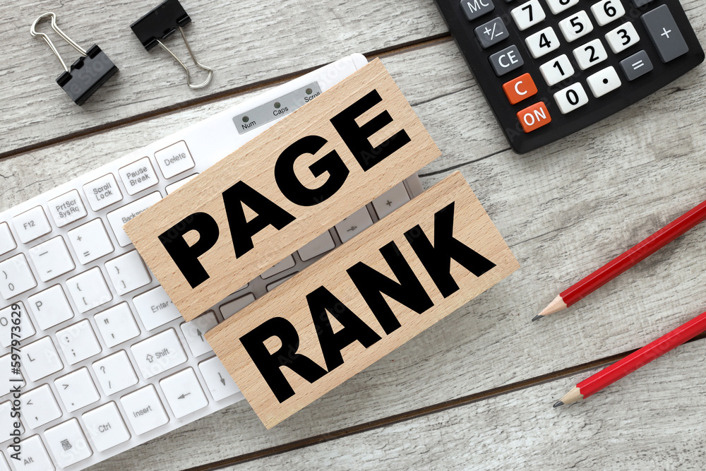 Poster rank button text on wooden blocks on a gray background. bars on white keyboard