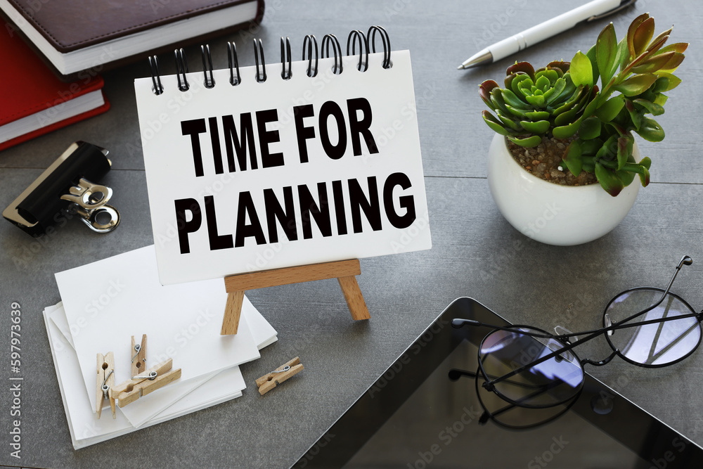 Poster time for planning notebook with text on stand